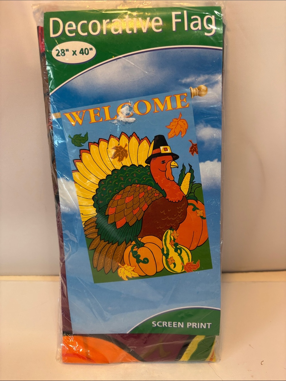 Meadow Creek" brand Thanksgiving decorative flag featuring a turkey and pumpkins